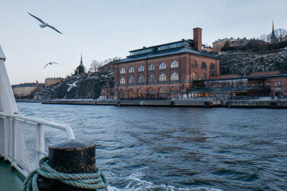 The brick facade of Fotografiska museum above the waterfront in central Stockholm