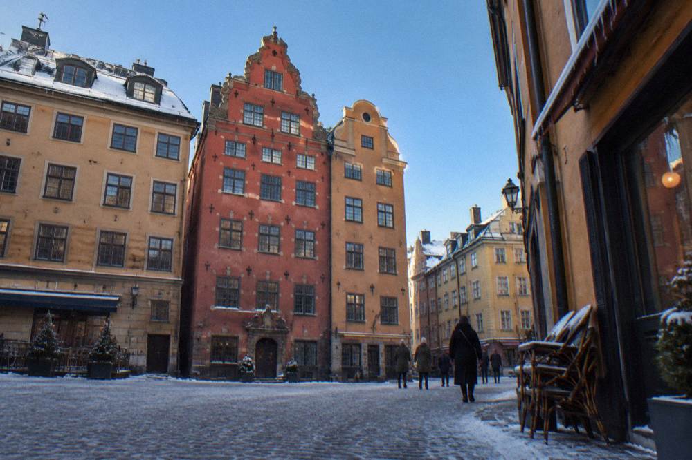 Colourful merchant houses lining a small square in Stockholm's old town